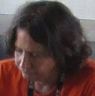 Man and woman who always illegally smoke their electronic cigarettes at McDonald's or McDonalds - Mc Donald's or Mc Donalds - woman's face 