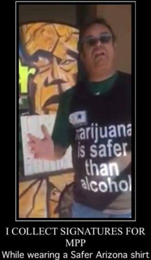 I collect signatures for MPP while wearing Safer Arizona t-shirt - I collect signatures for Marijuana Policy Project while wearing Safer Arizona t-shirt